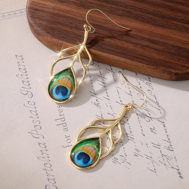 Brincos pendurados vintage boho olho de pavão