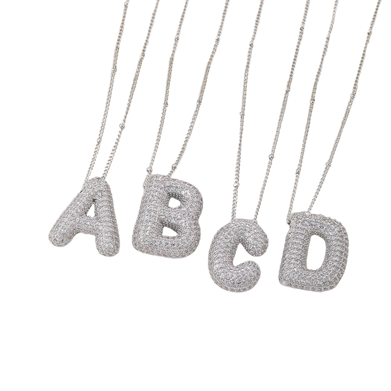 Conjunto de colar inicial em letras bolha