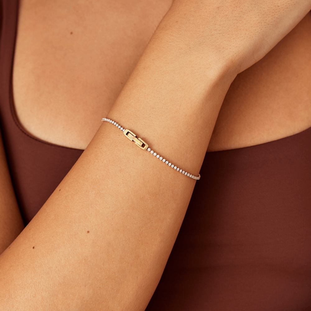 Pulseira Niyah de Cristal Branco com Detalhes em Ouro