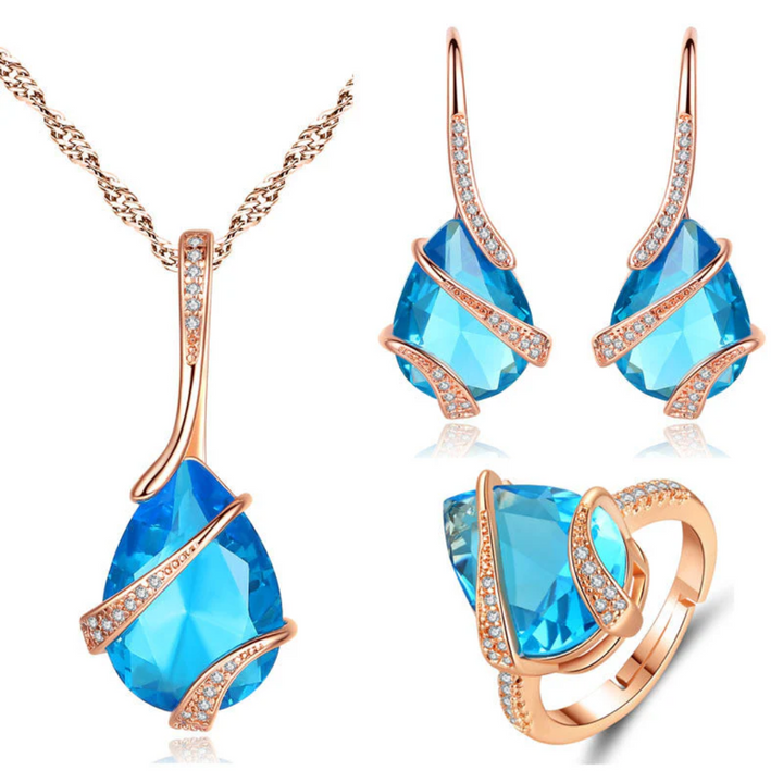 Conjunto Rosé Seraphina Thorne com Cristais Azuis (Colar, Brincos e Anel)